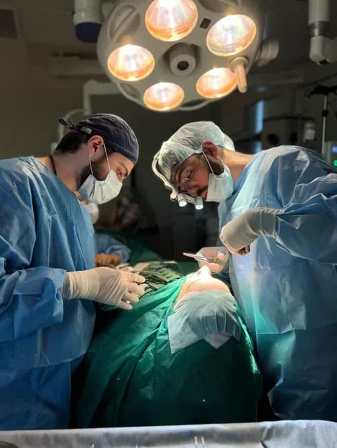Surgeons working in an operating room